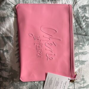 Kate Spade Pink Wristlet Clutch with Embossed Design